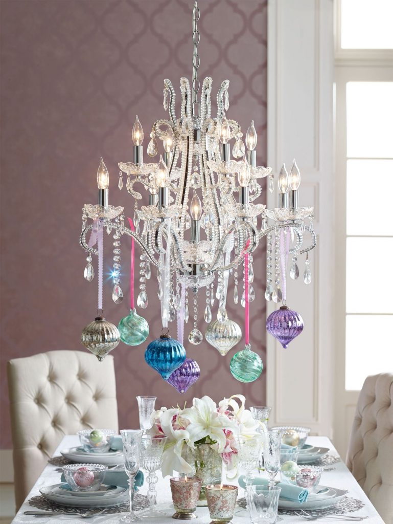 Christmas Decoration tip: Hanging Christmas ornaments from chandeliers.